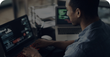 A man working at a laptop