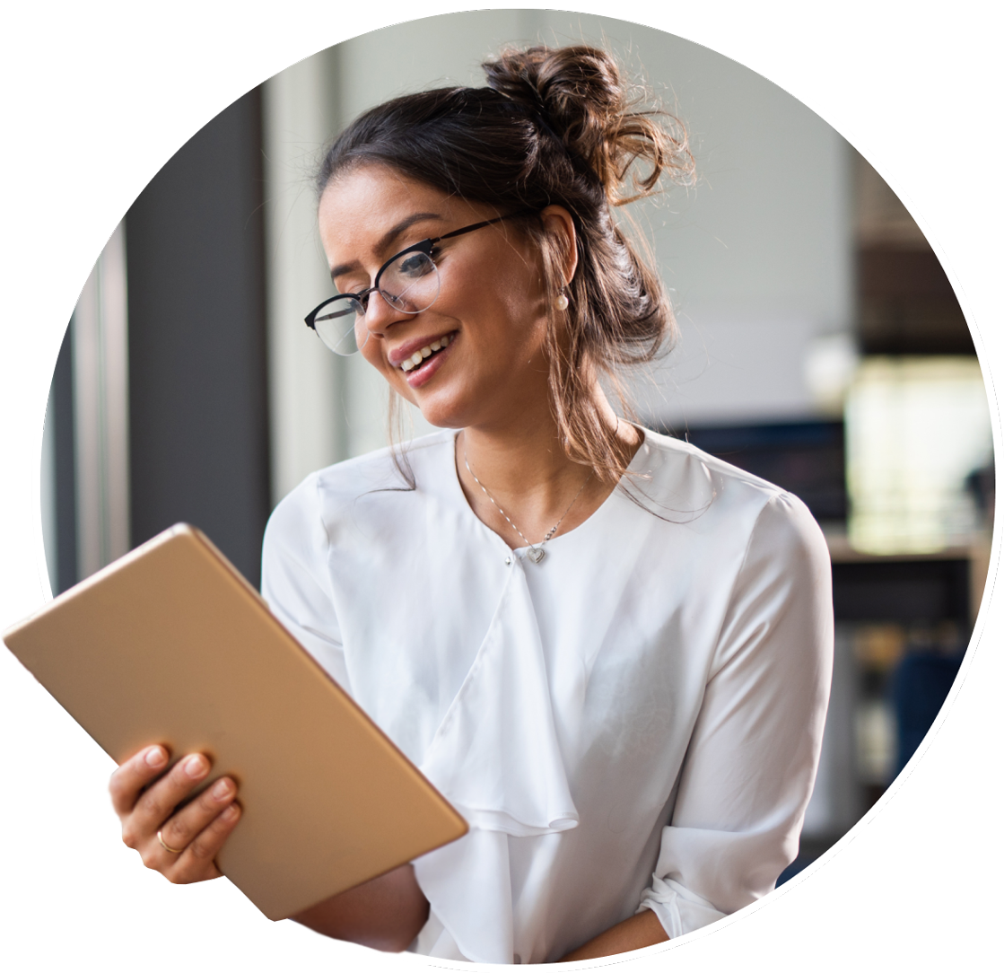 Photo of professional woman using tablet device.