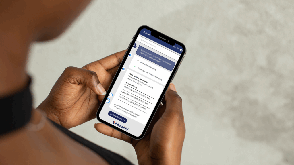 Lakeside's SysTrack Mobile Experience shown on a mobile phone being held.